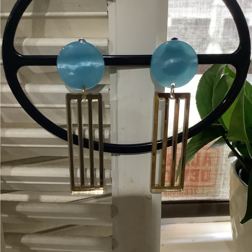 Gold Rectangular clip on earrings.